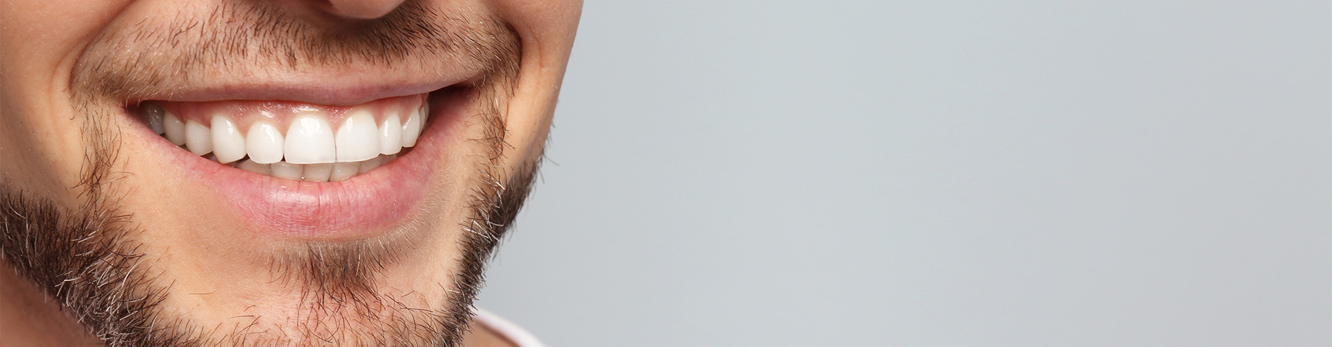 close up of a man's smile