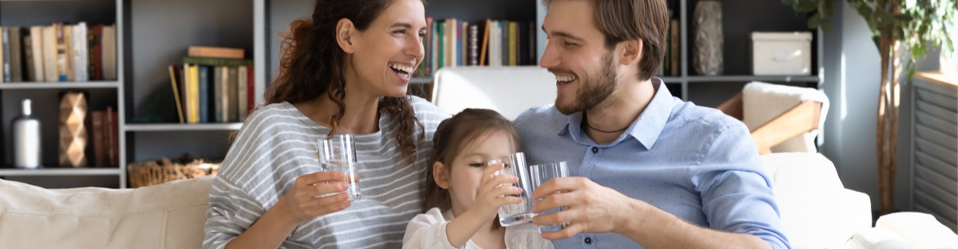 family drinking water together