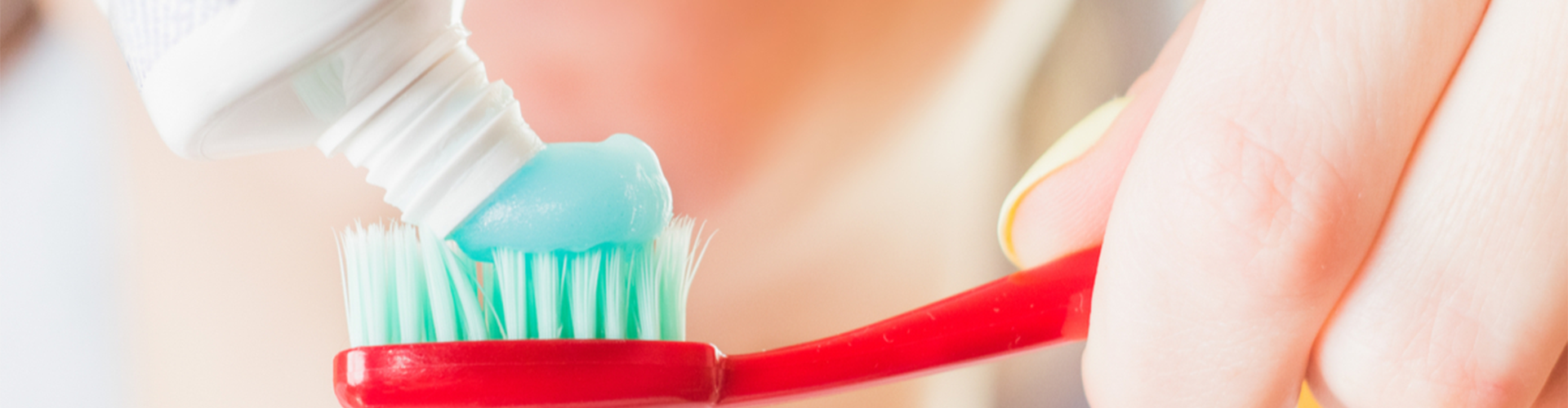 toothbrush with toothpaste on it