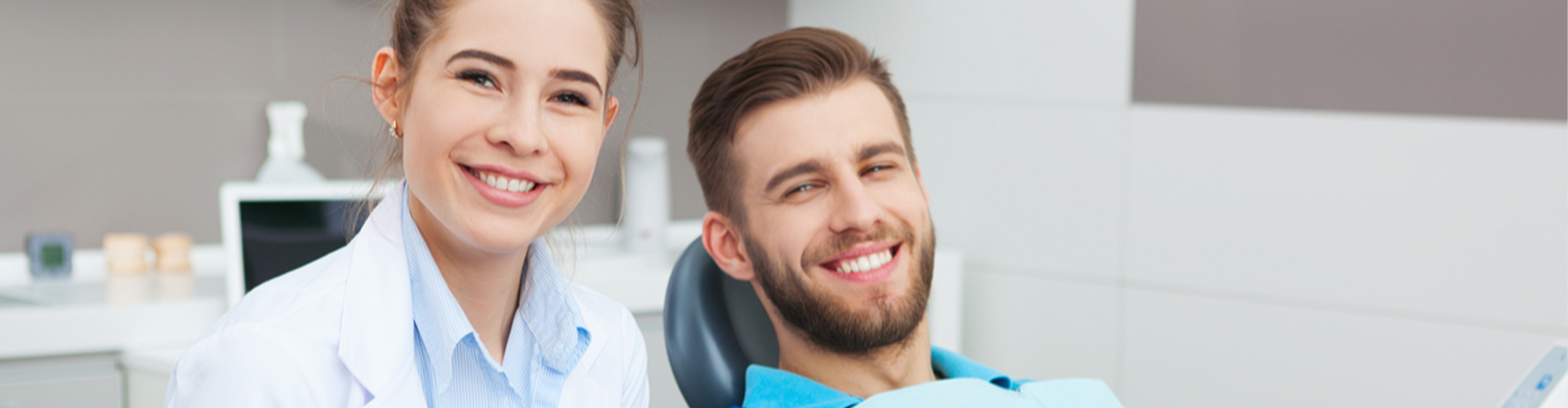 patient and dentist smiling 